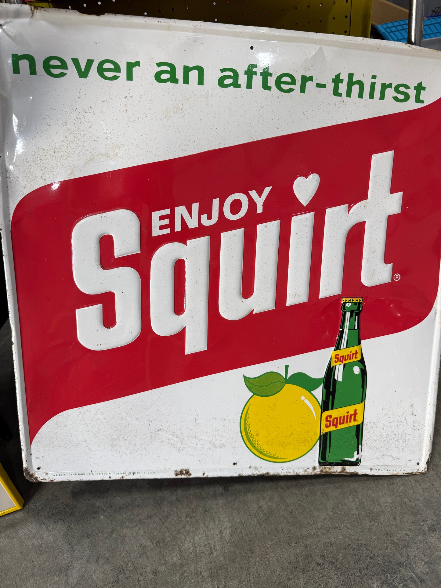 Original Squirt Embossed Tin Sign