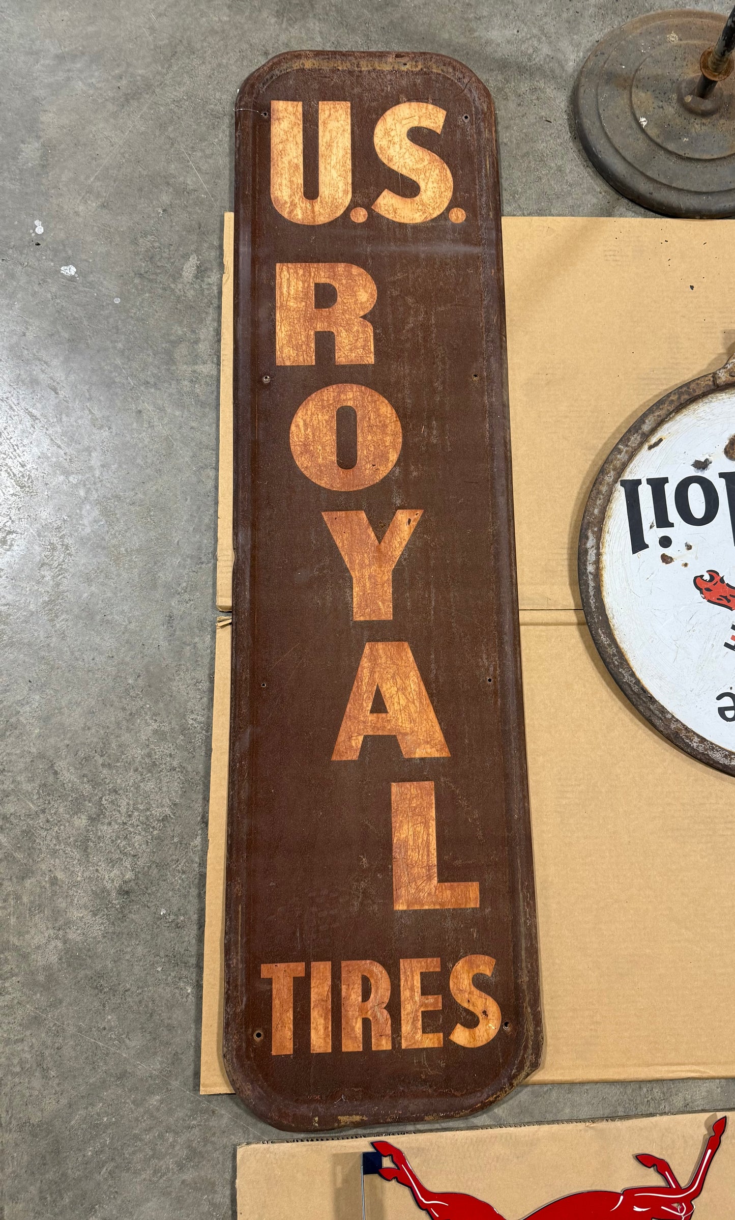 U.S. Royal Tires Embossed Sign