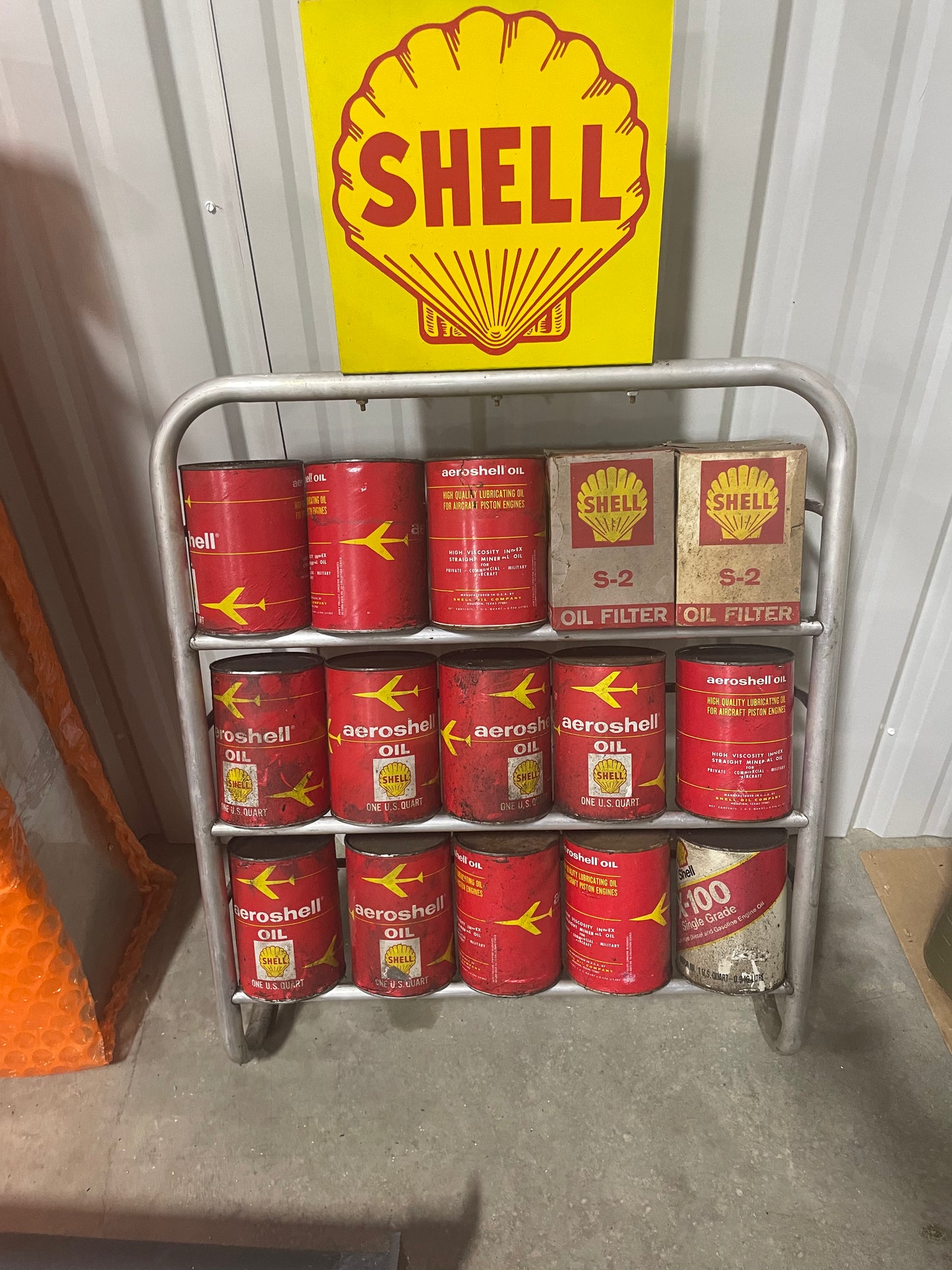 Shell Oil Can Rack with Oil cans