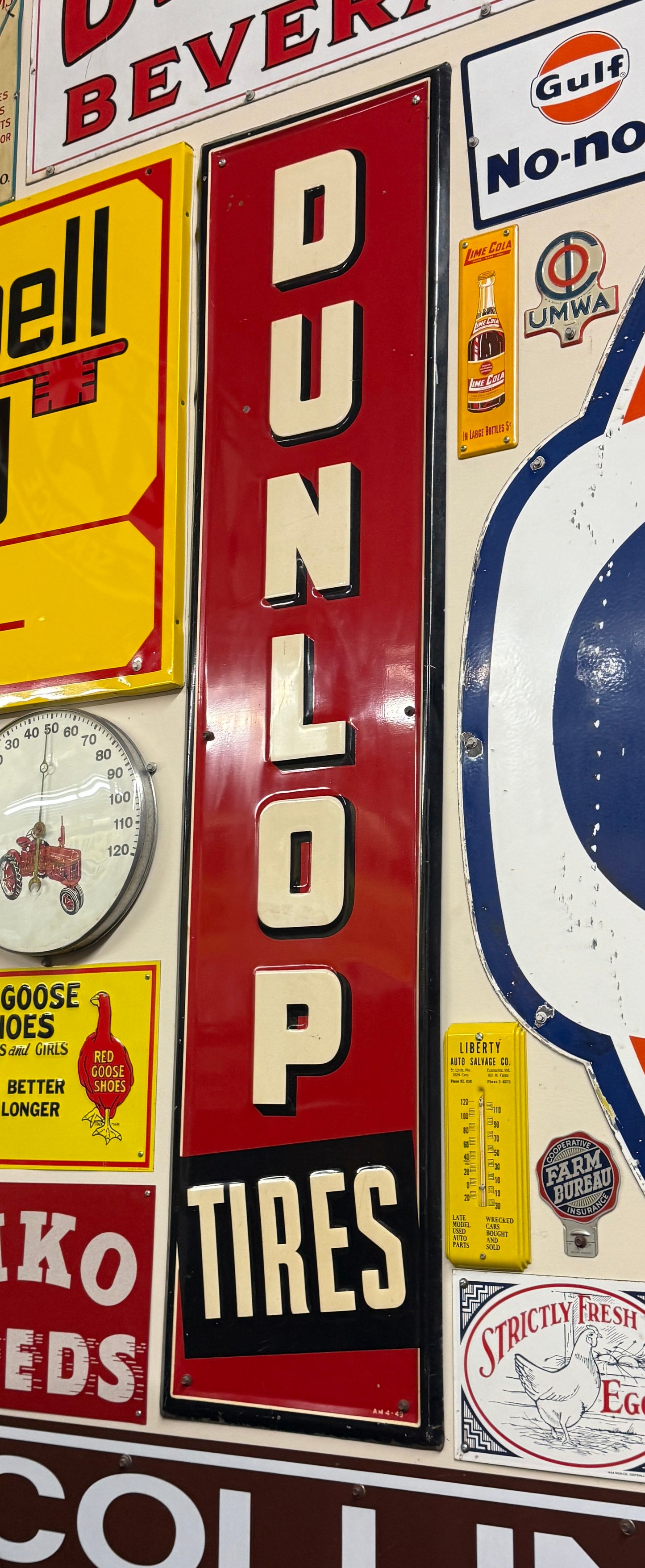 Dunlop Tires Red Vertical Sign