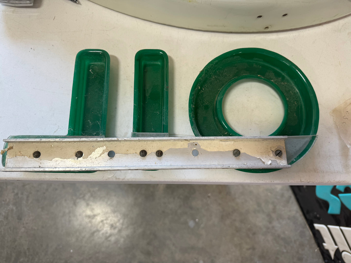 OIL mounted letters
