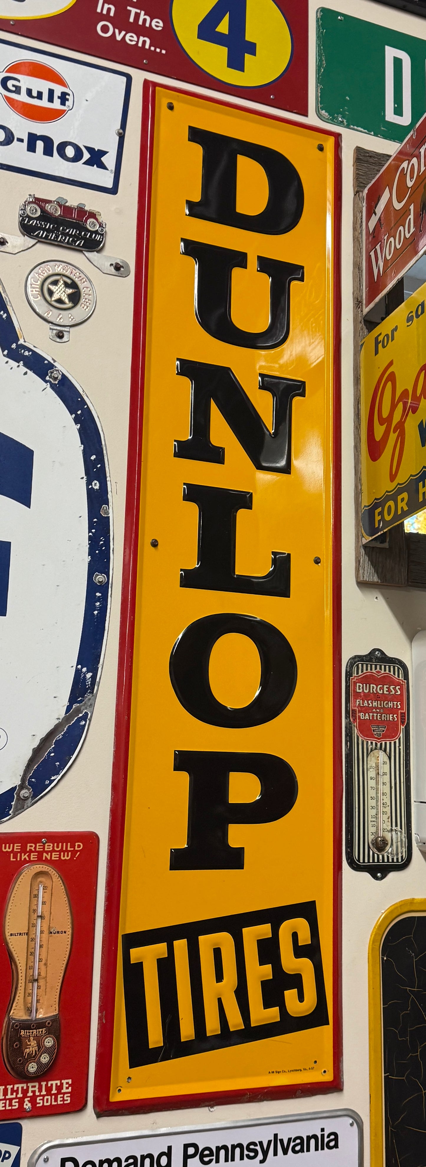 Dunlop Tires Yellow Vertical Sign