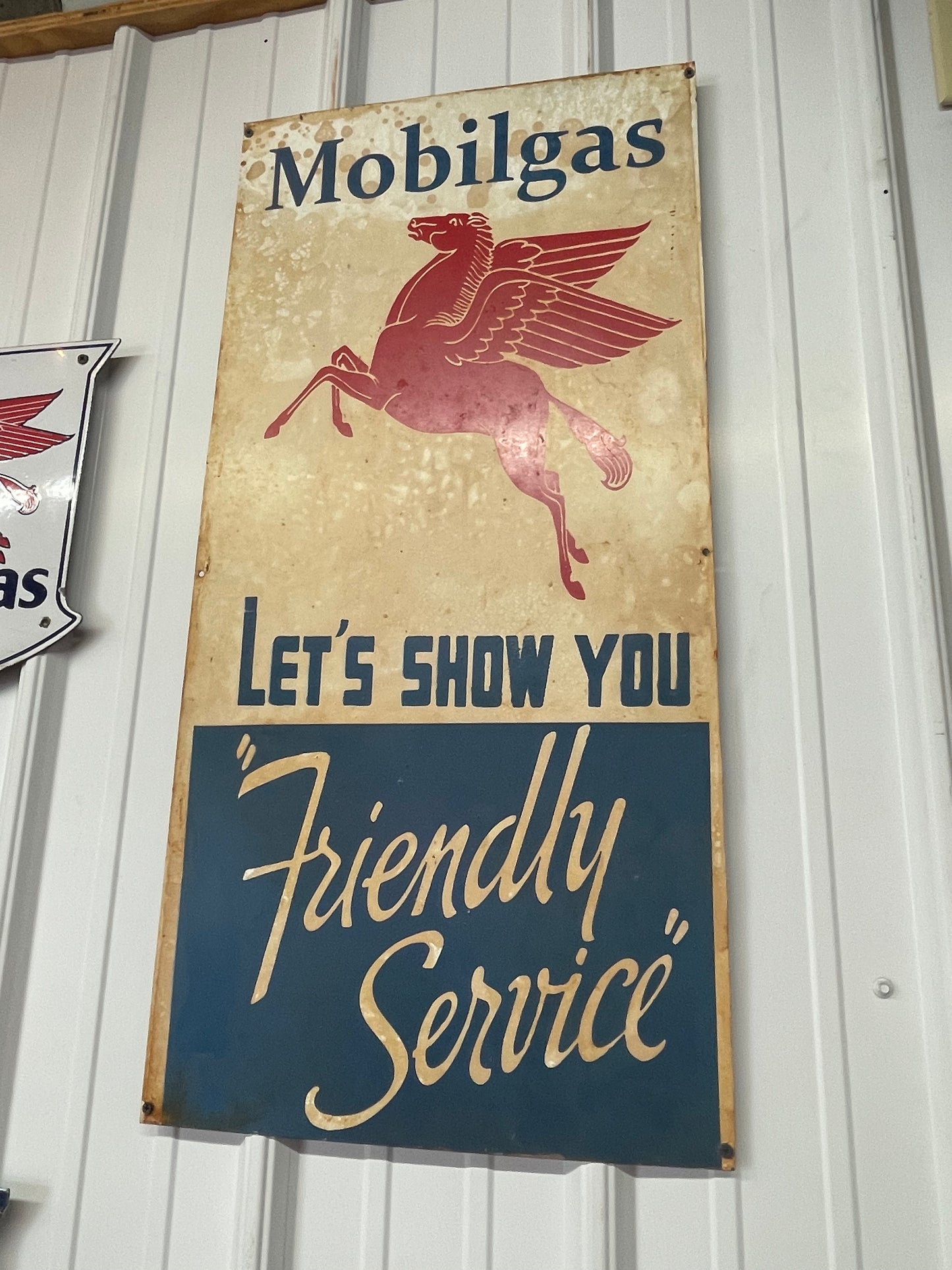 Mobilgas Let's Show You Friendly Service Pegasus Sign